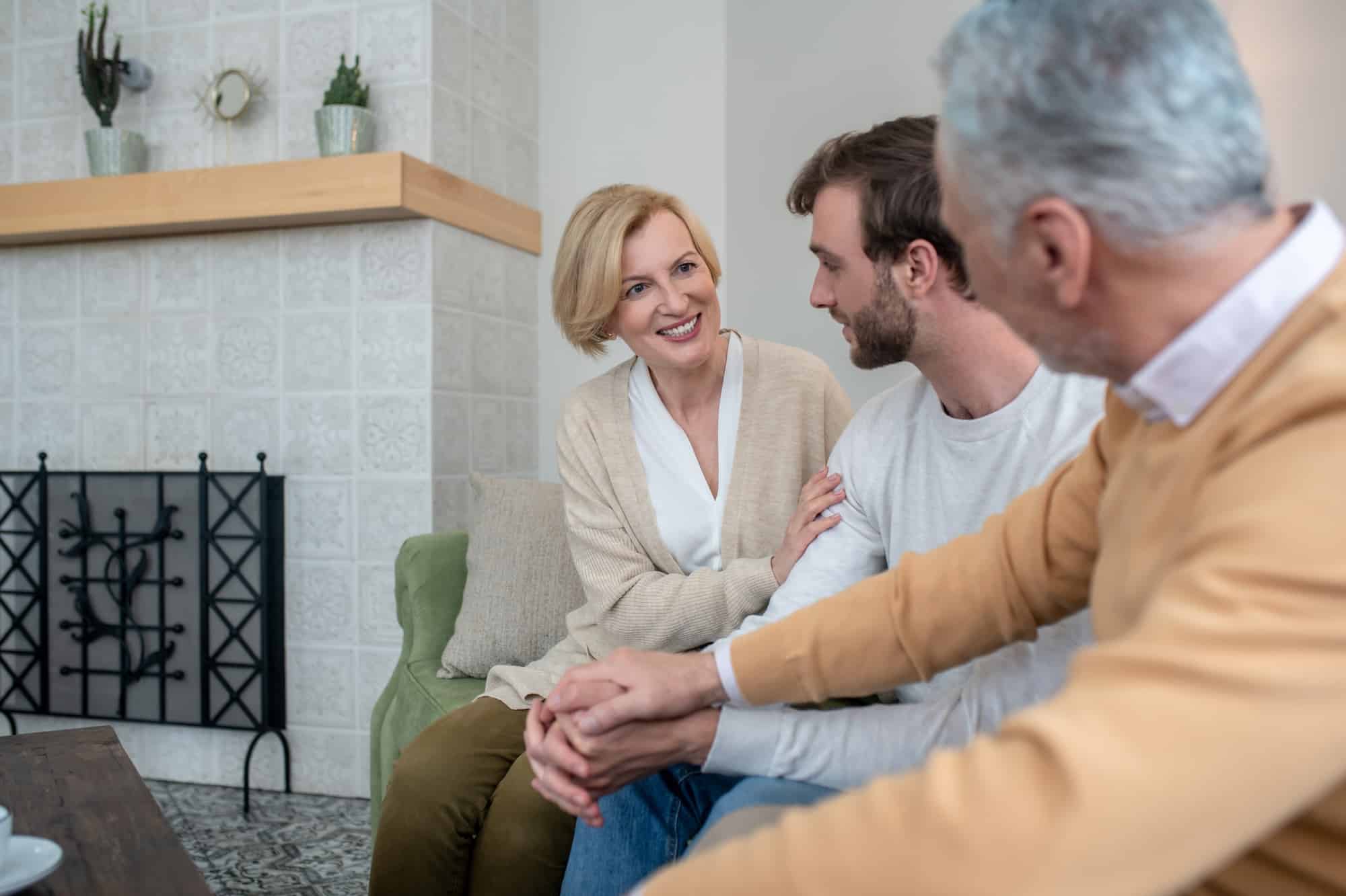 Family sitting together and talking