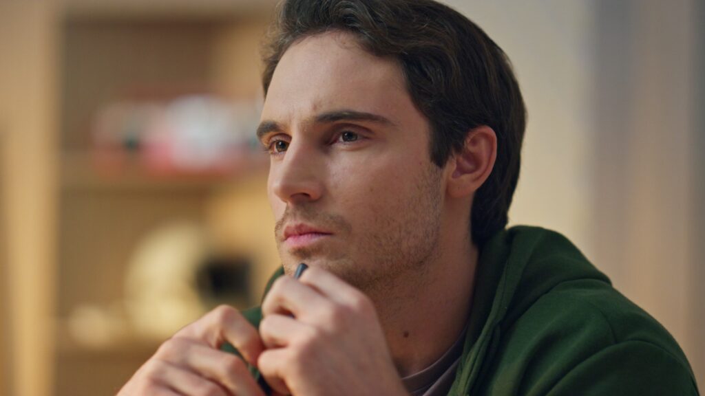 Thinking man pondering solution in office closeup. Designer waiting inspiration